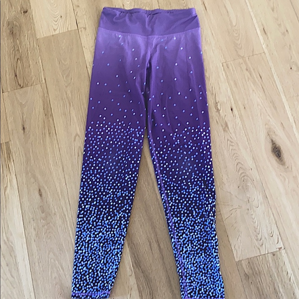 Purple polka dotted pants.